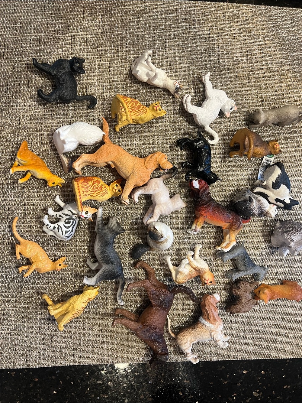 Assorted cat and dog figurines